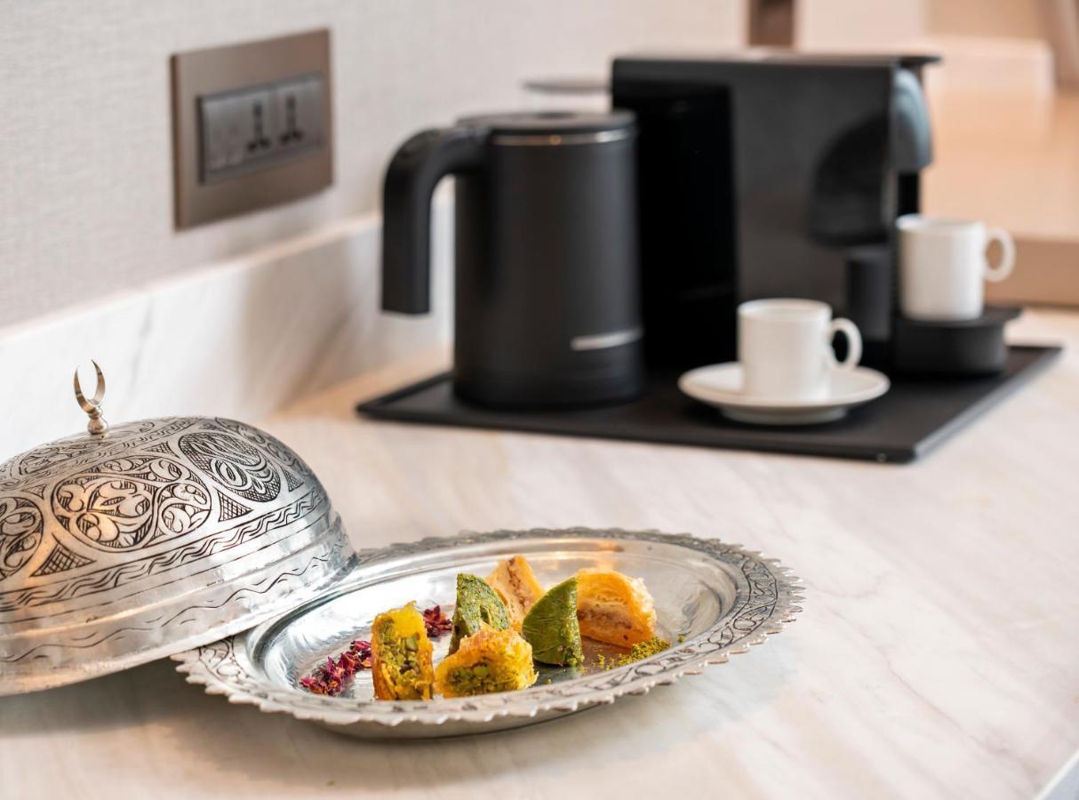 Address Istanbul Hotel Екстериор снимка A coffee machine in a hotel room