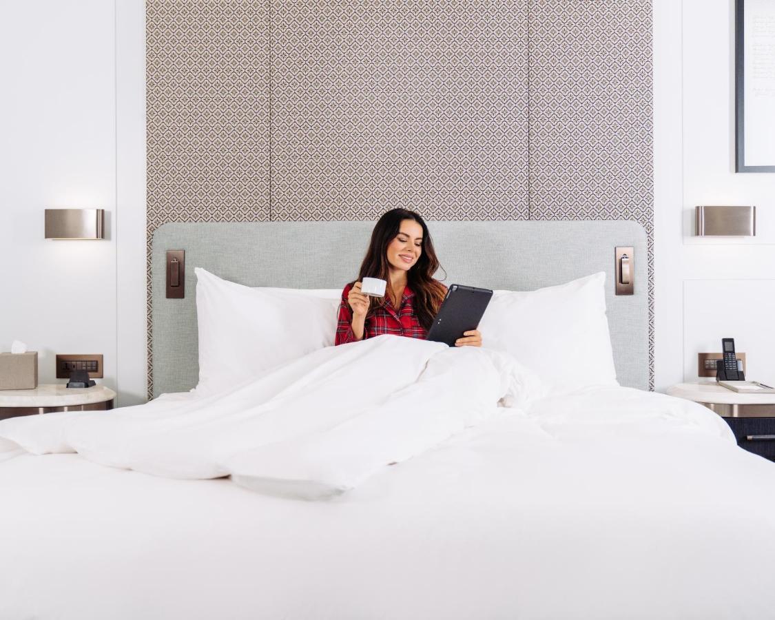 Address Istanbul Hotel Екстериор снимка A guest in a bedroom at the Hilton London Paddington
