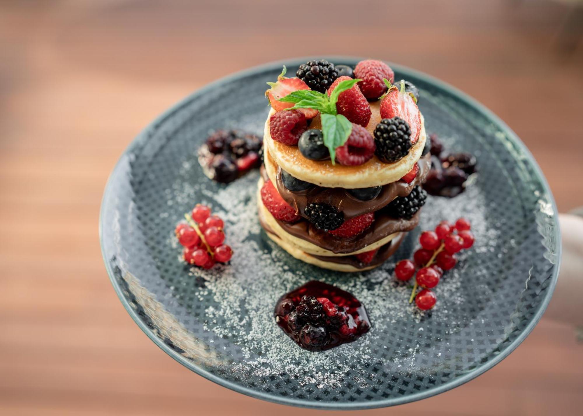 Address Istanbul Hotel Екстериор снимка A stack of pancakes with fruit