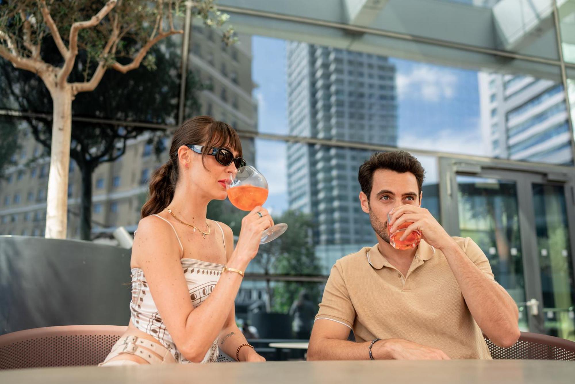 Address Istanbul Hotel Екстериор снимка A couple drinking Aperol Spritz
